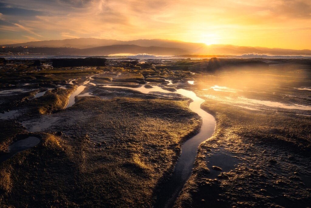 Golden sunset over coastal wetlands and winding tidal channels, landscape photography, Gran Canaria
