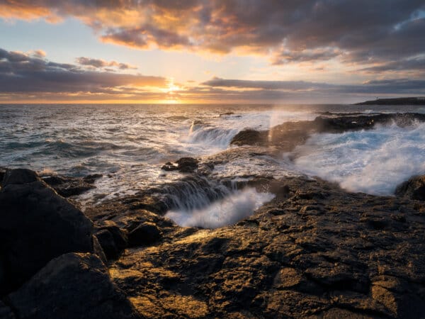 Dramatic sunset over rocky Atlantic coastline, Gran Canaria
