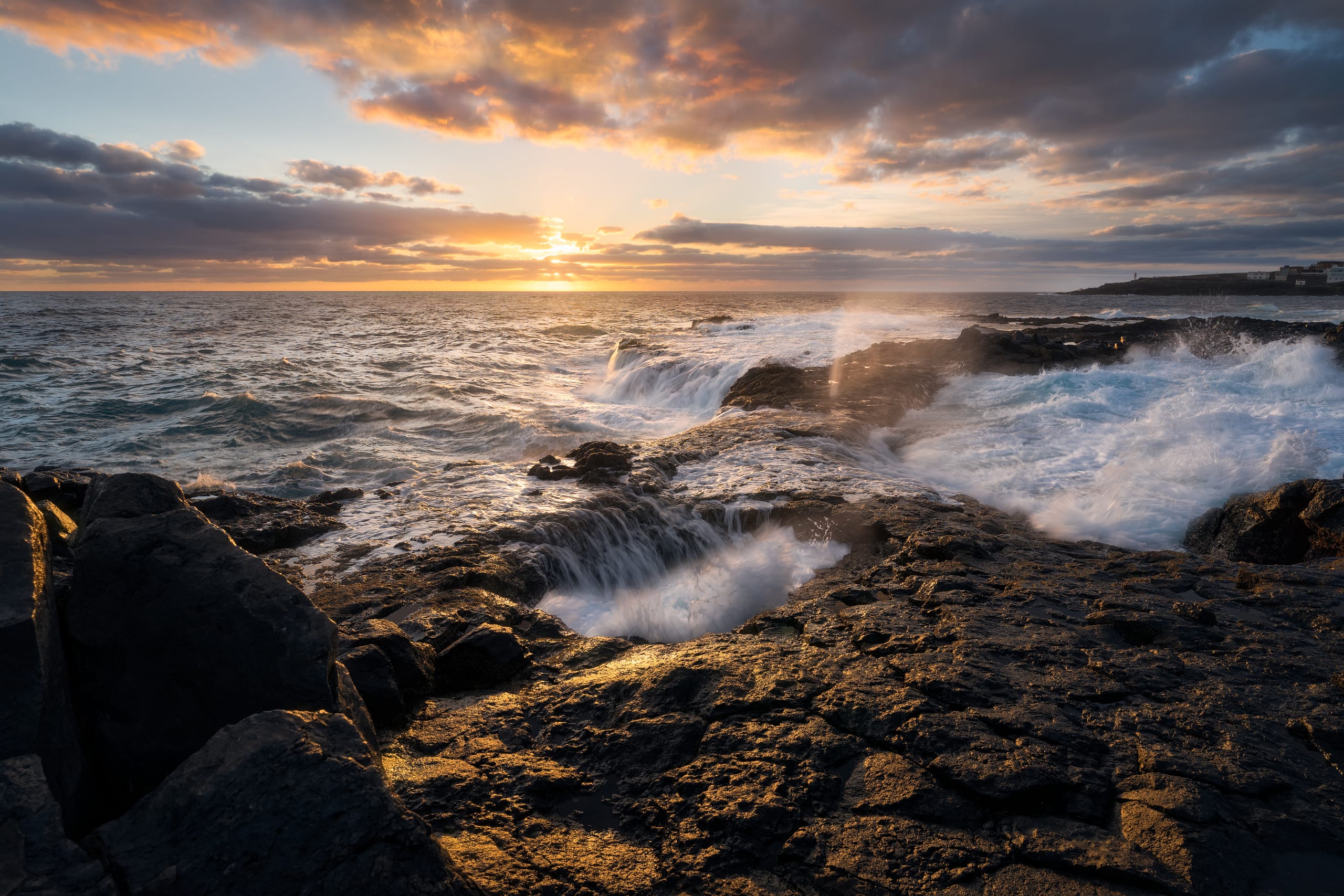 Dramatic sunset over rocky Atlantic coastline, Gran Canaria