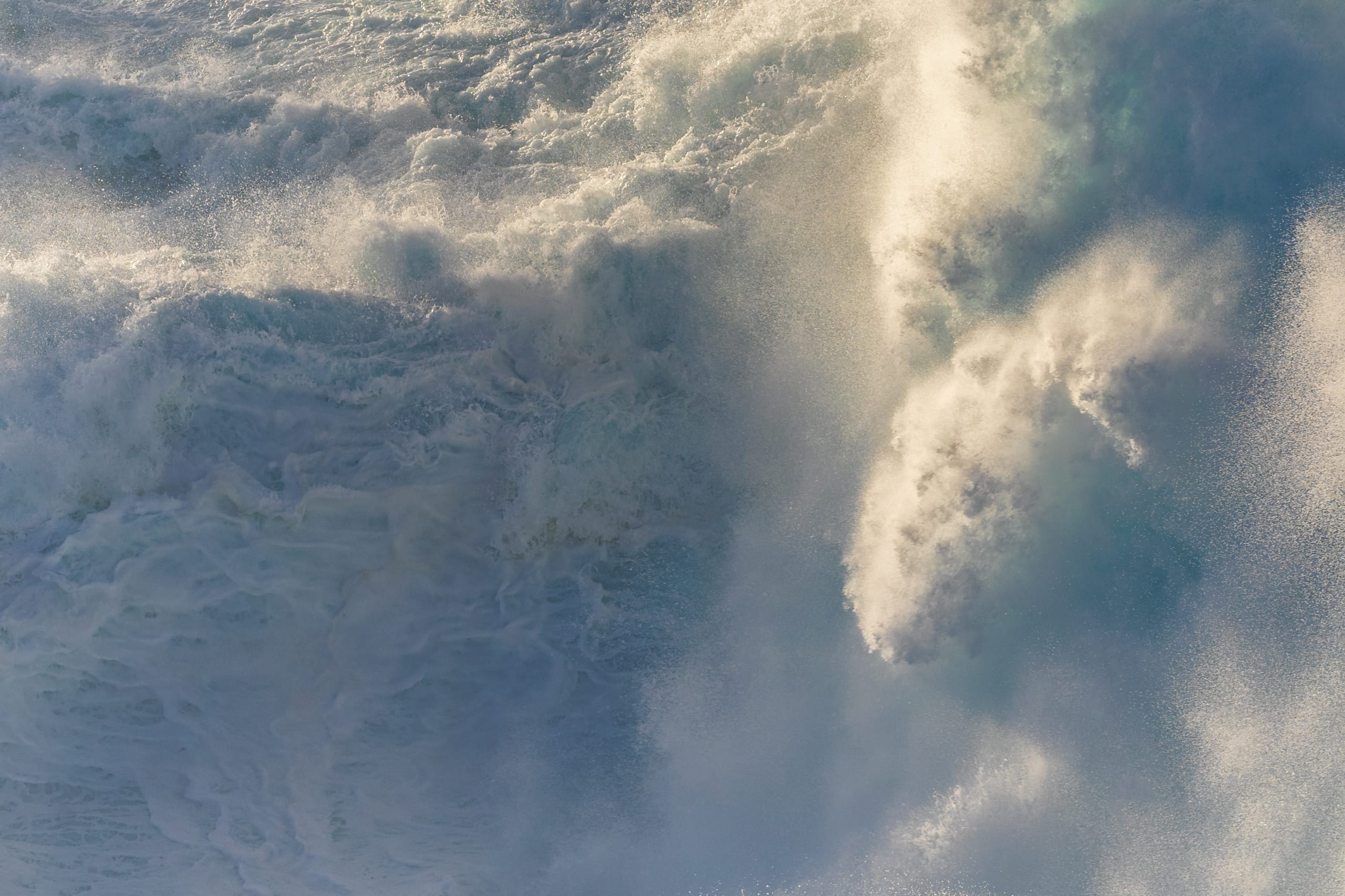 Powerful breaking wave with white foam spray, Gran Canaria coastline