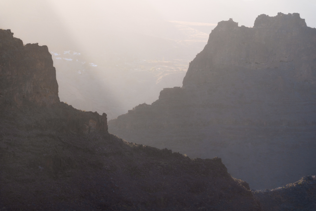 Dramatic mountain peak emerging from mist and fog, Gran Canaria